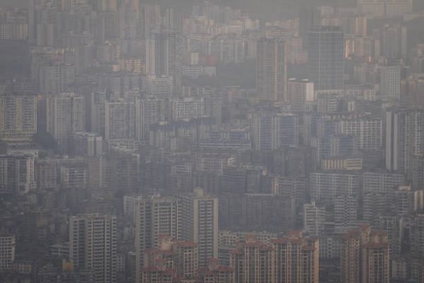 笼罩在浓雾中的重庆。（Cheng Xin/Getty Images）