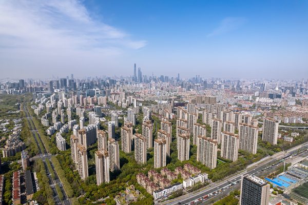 The drone aerial view of residential district in Pudong with sky