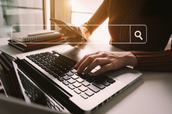 Searching Browsing Internet Data Information with blank search bar.businessman working with smart phone, tablet and laptop computer on desk in office. Networking Concept