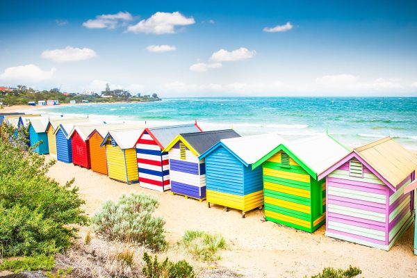 Beautiful Bathing houses on white sandy beach at Brighton beach,